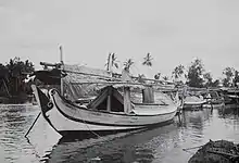 Madurese ship (golekan) docking in the bank of the Martapura River