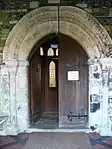 The oldest part of the present building, the c.1120 Norman doorway in the north porch.