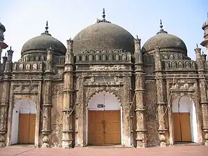 Image 12The Khan Mohammad Mridha Mosque on Lalbagh road is situated less than half a kilometre west of the Lalbagh Fort, in an area called Atish Khana in old Dhaka. Two Persian inscriptions, one over the central archway and the other over the central Mihrab, speak of its construction during 1704–05 AD.Photo Credit: Ragib Hasan