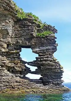 Image 10Jurassic sandstone rock arch on the Strathaird peninsula of SkyeCredit: John Allan