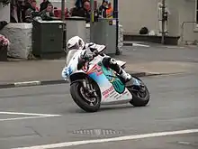 2014 Isle of Man TT  TT Zero Practice Session Bruce Anstey (5) Shinden San / Team Mugen at Parliament Square, Ramsey 1 June 2013.