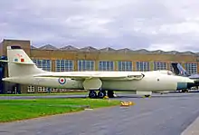 A sleek white jet aircraft