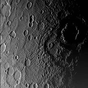 Vivaldi is the large, shadow-filled, double ringed crater to the upper right.  From MESSENGER's first flyby in January 2008.