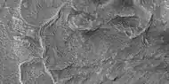 Mostly curved ridges.  Picture taken with HiRISE under HiWish program.