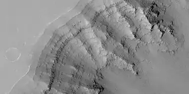 Close view of layers in Louros Valles, as seen by HiRISE under HiWish program. Note this is an enlargement of a previous image.