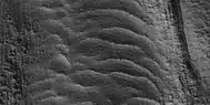 Close view of tongue-shaped glacier, as seen by HiRISE under HiWish program. Surface is broken up into cubes.