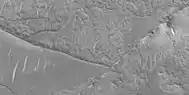 Close view of ridge networks, as seen by HiRISE under HiWish program.   Ridges of different sizes are visible in this image.