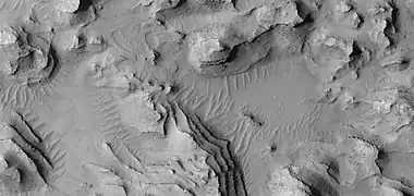 Close view of layers, as seen by HiRISE under HiWish program.  A fault is visible.
