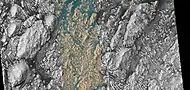 Wide view of layers in Danielson Crater, as seen by HiRISE under HiWish program. Center color band of the HiRISE image is visible.