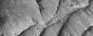 Close view of curved ridges, as seen by HiRISE under HiWish program.  These formed underground and then were uncovered by erosion.
