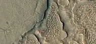 Close view of hollows formed when ice left the ground by sublimation