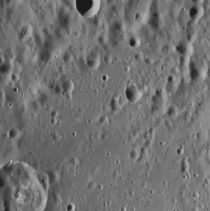 Unnamed crater in northwestern Homer which contains hollows and has dark ejecta.