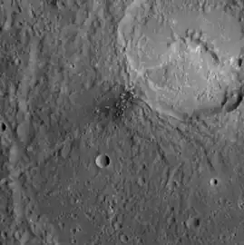Detail of dark spot in Matisse crater.  Hollows are present in the dark spot and in Ngu Facula in the unnamed crater in upper right.