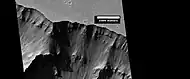 Wide view of layers in wall of Valles Marineris, as seen by HiRISE under HiWish program