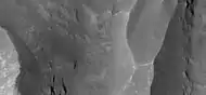 Thin dark layers on floor of Noctis Labyrinthus, as seen by HiRISE under HiWish program.  Note: this is an enlargement of a previous image.