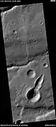 Pointed crater, as seen by HiRISE under HiWish program.  Impacting object may have struck at a low angle.