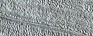 Close, color view of lineated valley fill, as seen by HiRISE under HiWish program