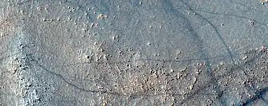 Close, color view of dust devil tracks, as seen by HiRISE under HiWish program