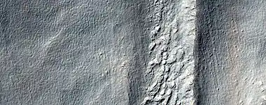 Close, color view of flow, as seen by HiRISE under HiWish program. Patterned ground is visible in the photo.