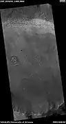 Wide view of crater floor, as seen by HiRISE under HiWish program.  Some depressions on the floor have a mound in the center.