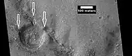 Crater with channels, as seen by HiRISE under HiWish program. Arrows show channels that carried water into and out of crater.