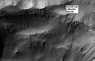 Electris Deposit, as seen by HiRISE.  Electris deposit is light-toned and smooth in the image in contrast to rough materials below.  Location is Phaethontis quadrangle.