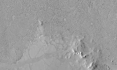 Lava flows in Elysium as seen by HiRISE. Upper part of image shows lava that solidified on the top then crumpled as lava still moved.