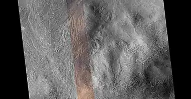 Wide view of channel network, as seen by HiRISE under HiWish program  Colored strip in center is about 1 km across.