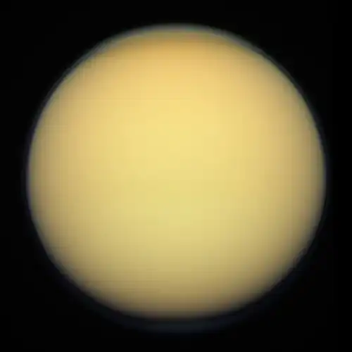 Image of a thick atmosphere that is yellow due to a dense organonitrogen haze