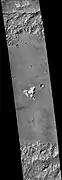 Fournier Crater, as seen by CTX camera (on Mars Reconnaissance Orbiter). The central mound is visible in the middle.