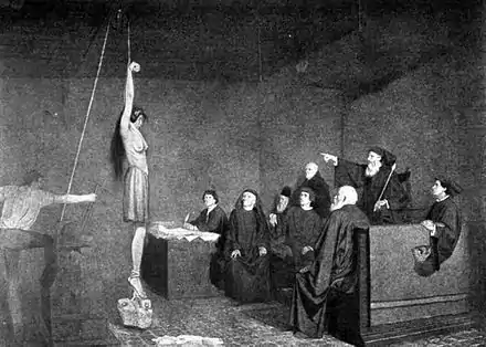 105-a suspected witch before the tribunal of the inquisition.jpg