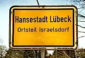 Entry into a built-up area (Lübeck). This sign also demarcates the start of a 50 km/h speed limit