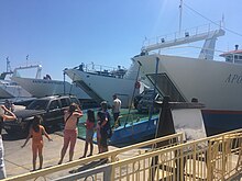 Evvia island's south Nea Styra port docks with 3 ferries to AG Marina in peak season summer schedule