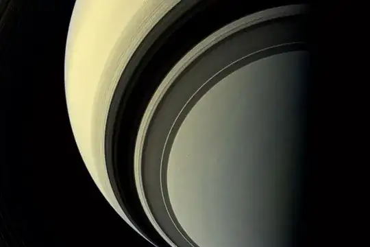 Saturn, with its rings casting a shadow on the cloud tops